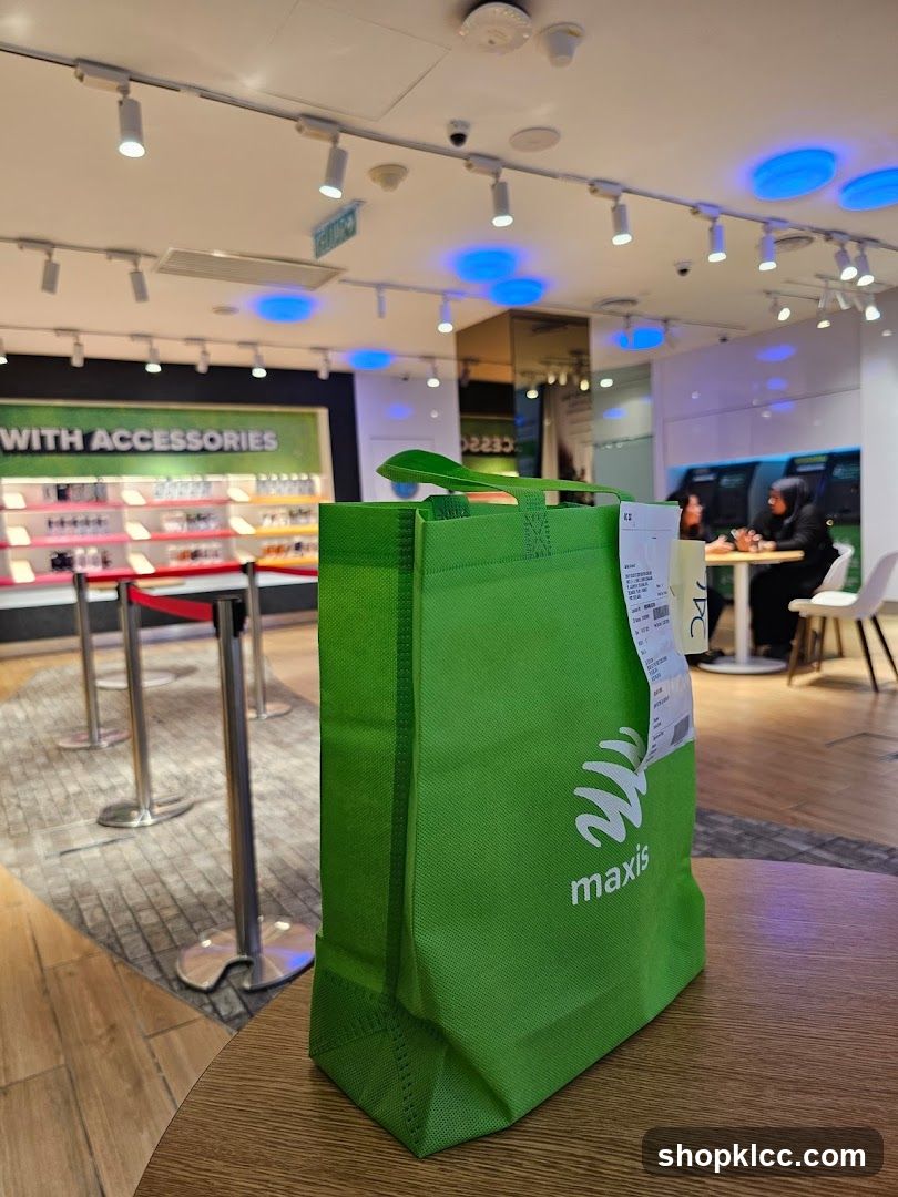 Green Shopping Bag with Maxis Logo
