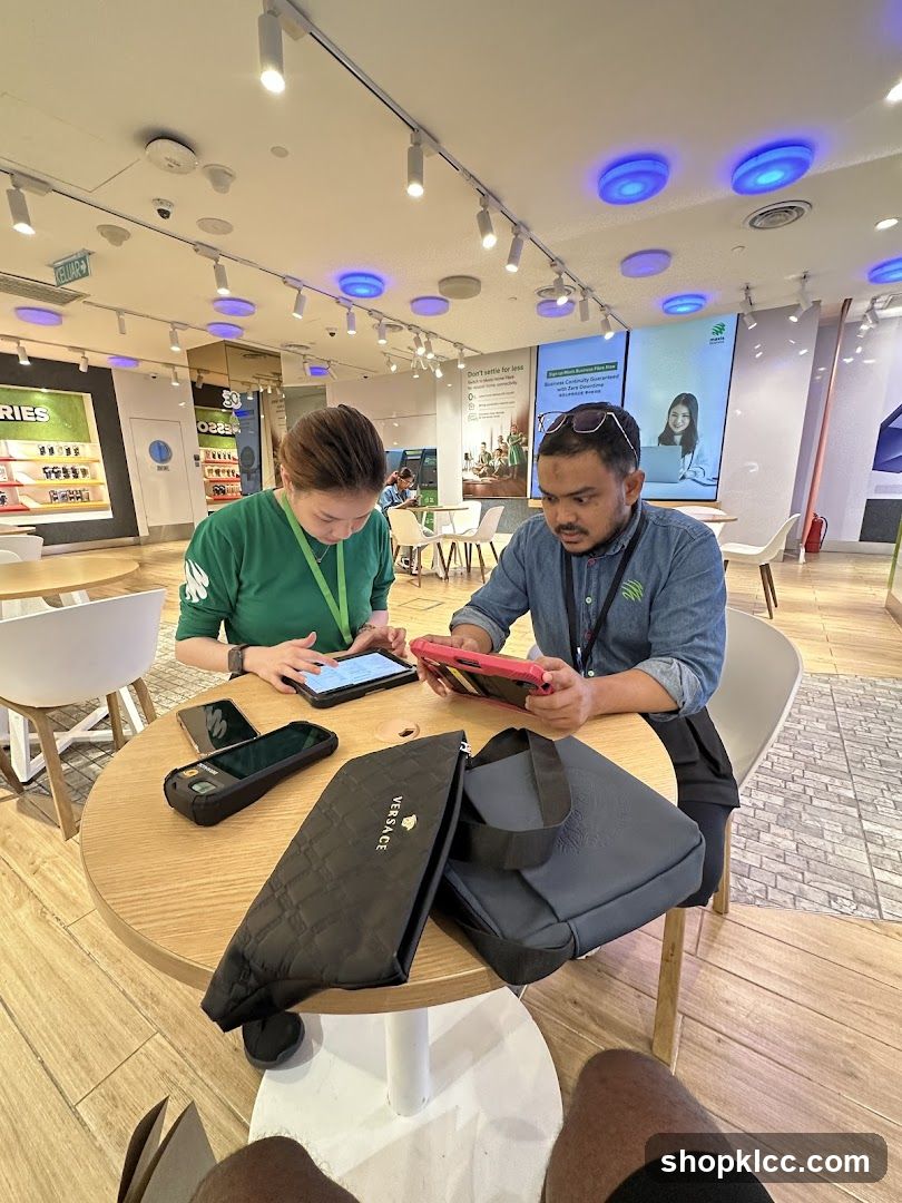 People using tablets in a store