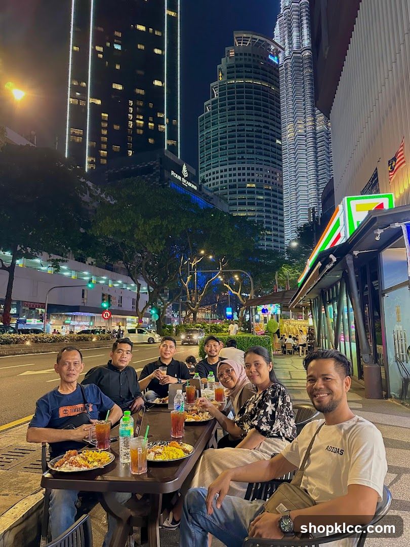 People dining outdoors at night