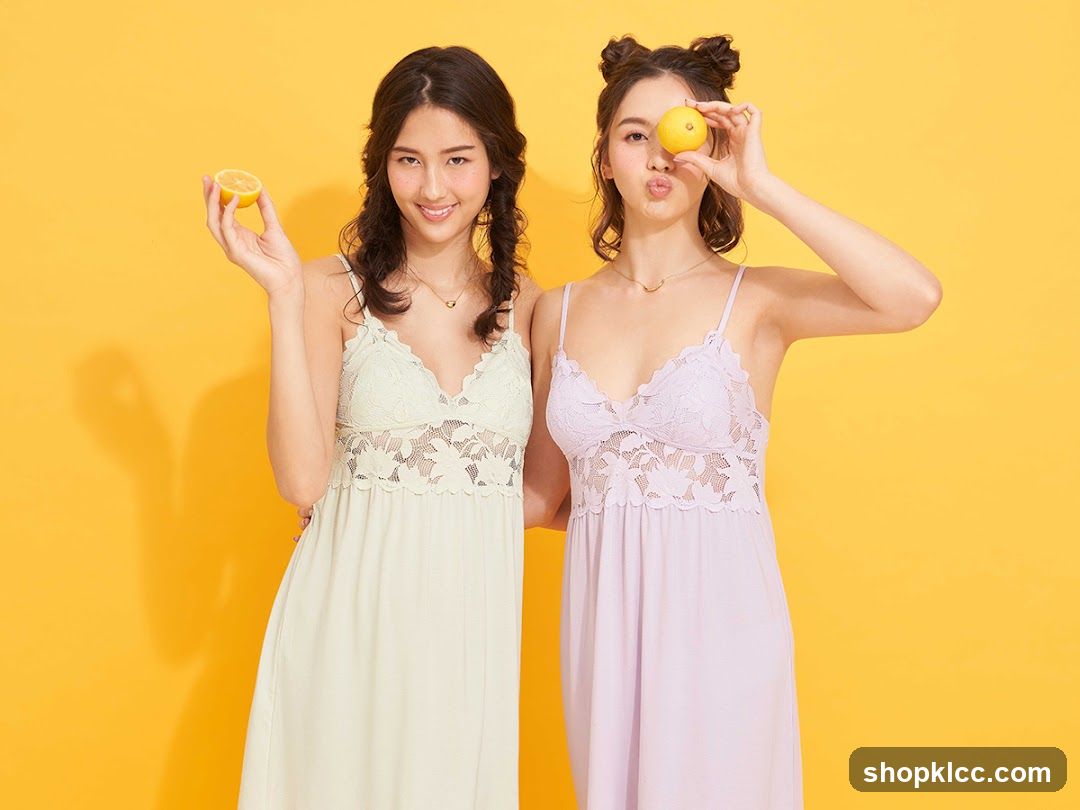 Two women in nightgowns holding lemons