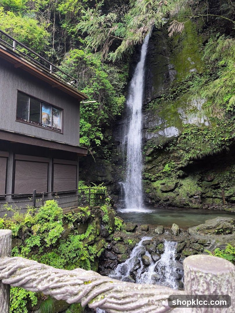 Waterfall and Building Scene