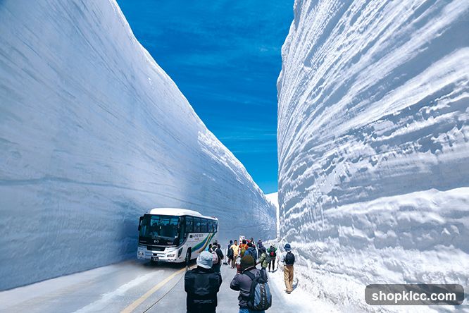 Snow Tunnel with Tourists and Bus