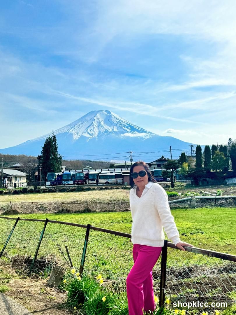 Woman in pink pants with Mount Fuji background