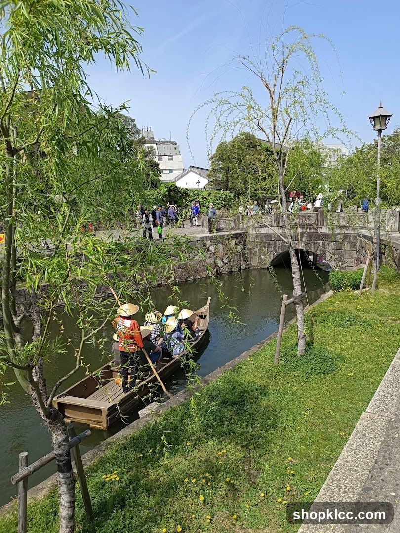Boat Ride on Canal with Pedestrians