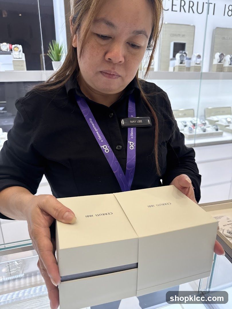 Sales Associate Holding a Cerruti 1881 Box