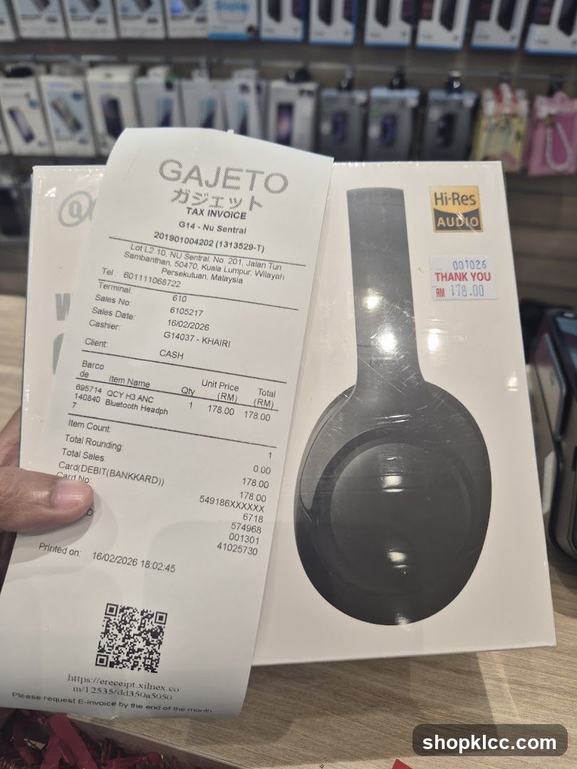 Tax Invoice and Headphones
