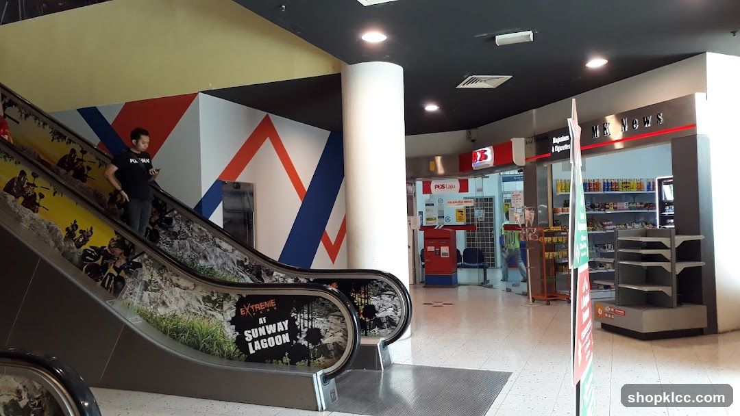 Mall Interior with Escalator and Shops