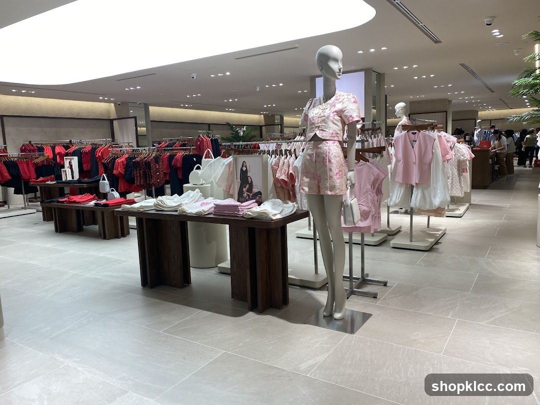 Clothing store interior with mannequins and apparel