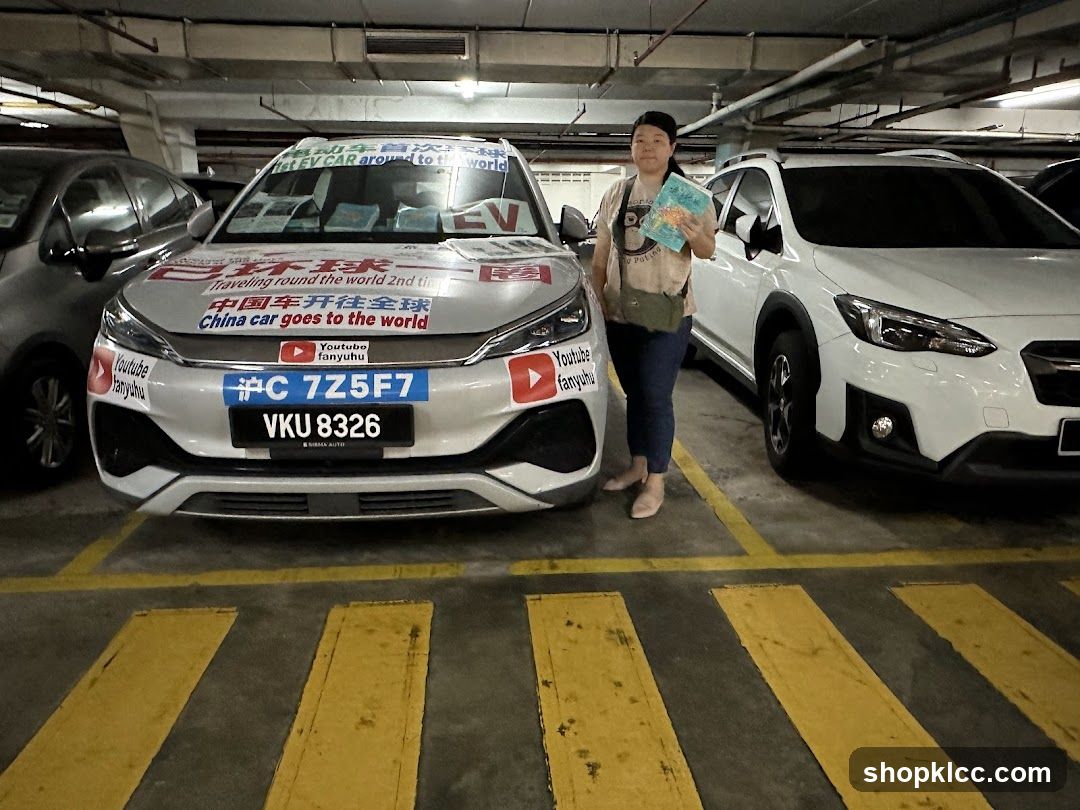 Woman Posing with a Decorated Electric Car