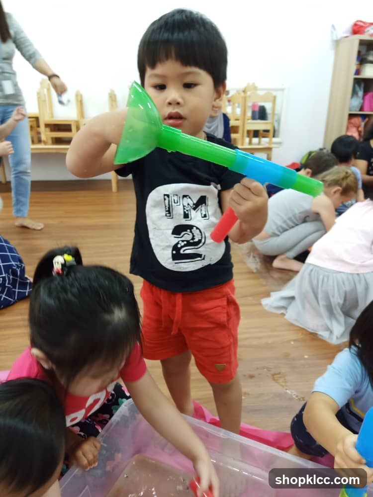 Children playing with water toys