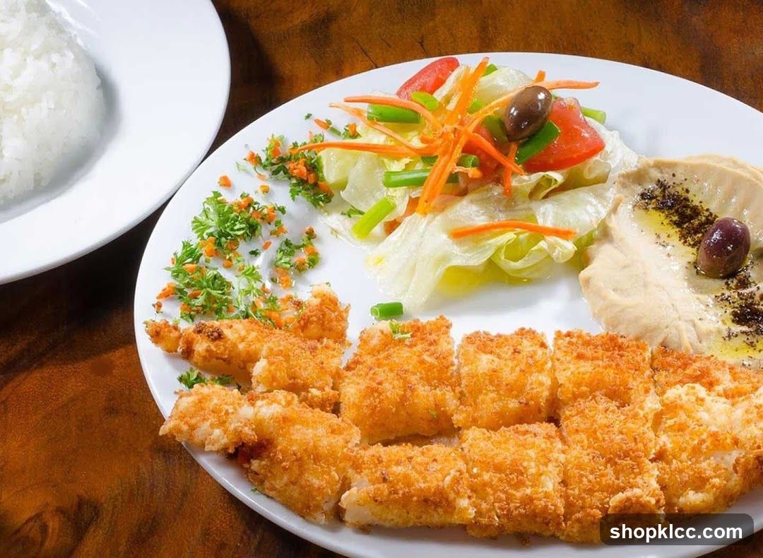Breaded Fish with Hummus and Salad