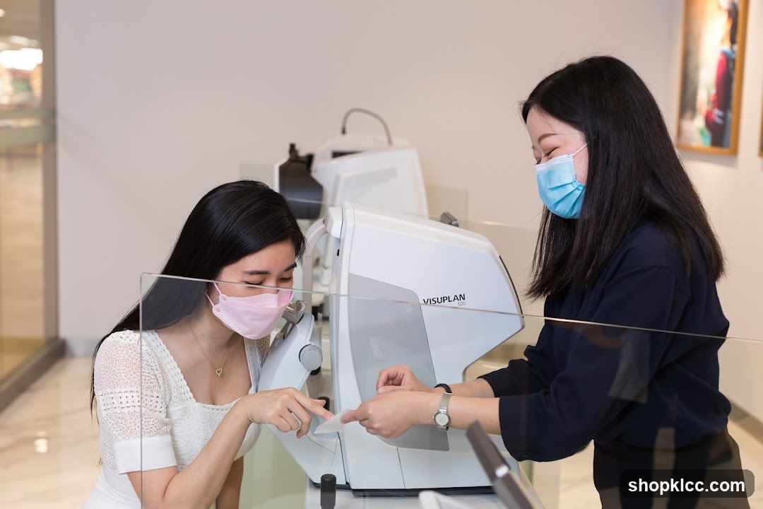 Optometrist examining a patient
