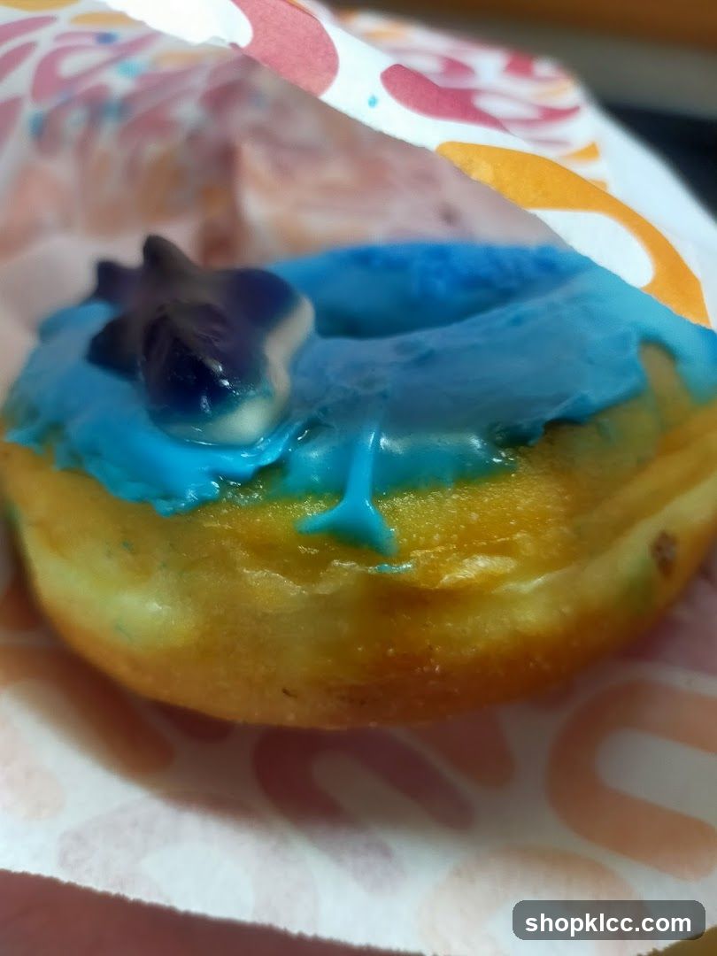 Blue Iced Donut with Gummy Topping