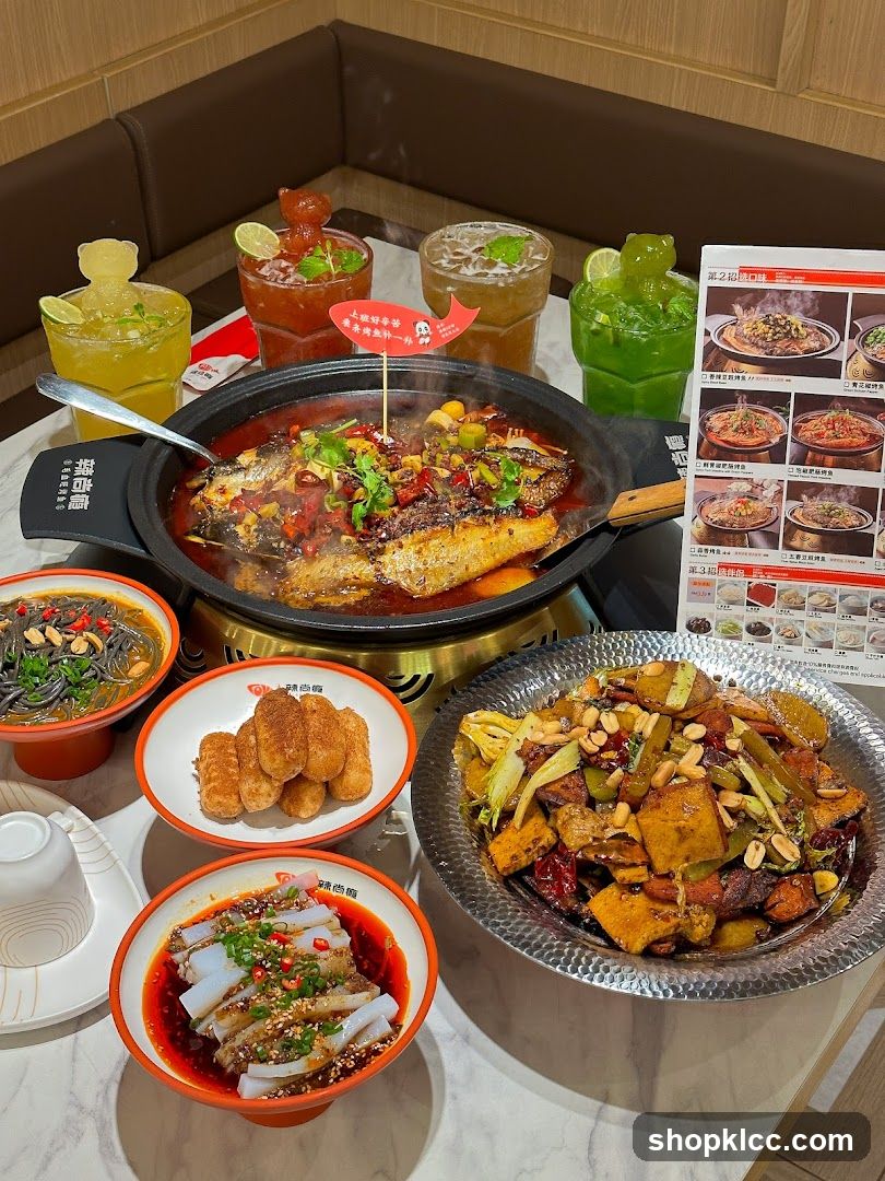 A table full of Chinese dishes and drinks