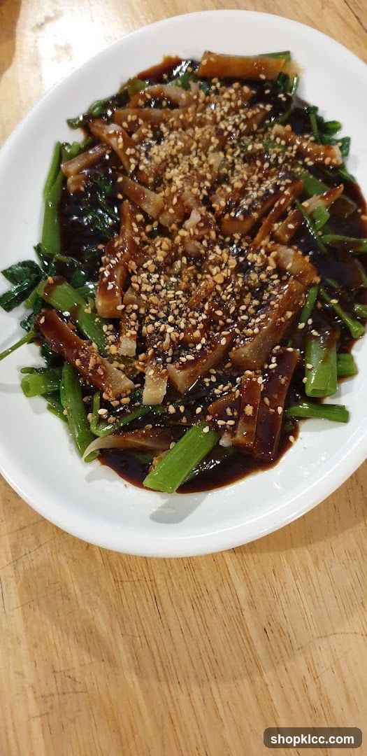 Sauced Vegetable Dish with Sesame Seeds