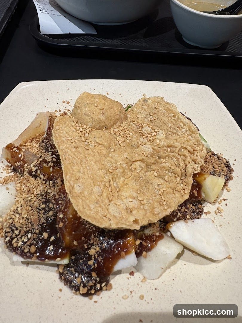 Sesame Crusted Dish with Sauce and Toppings