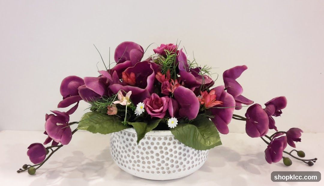 Artificial Flower Arrangement in White Perforated Pot