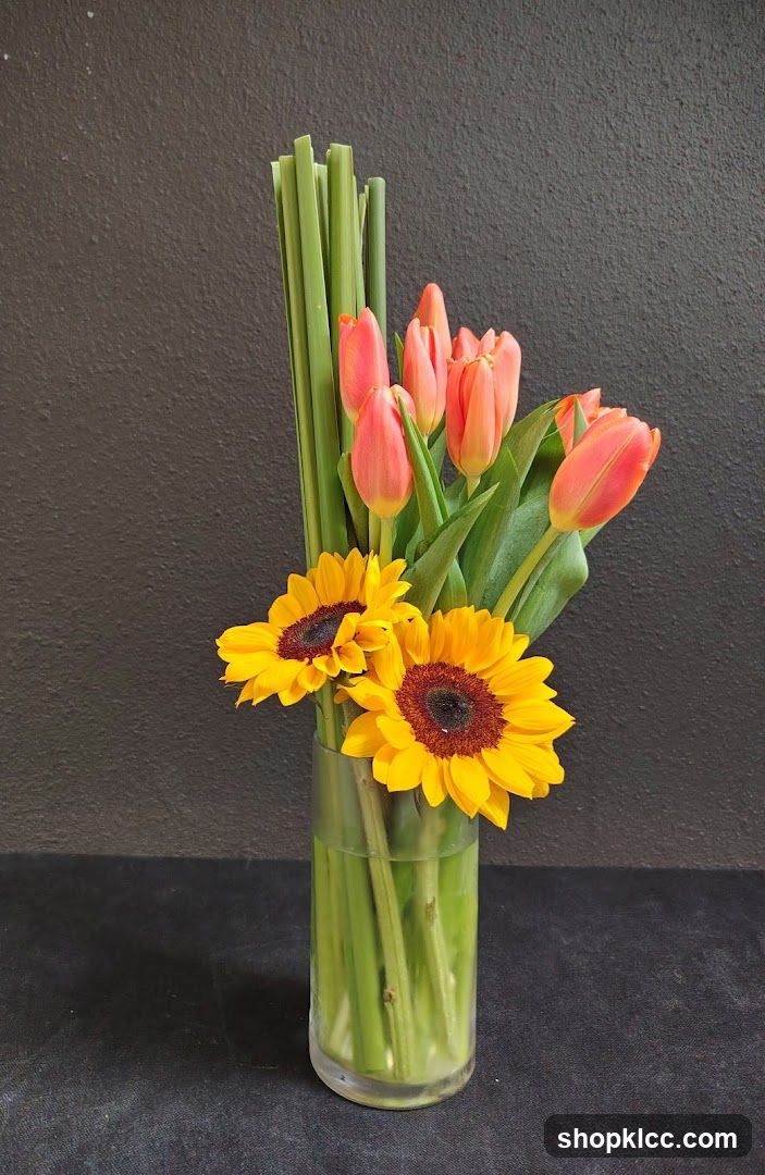 Sunflower and Tulip Bouquet in Glass Vase