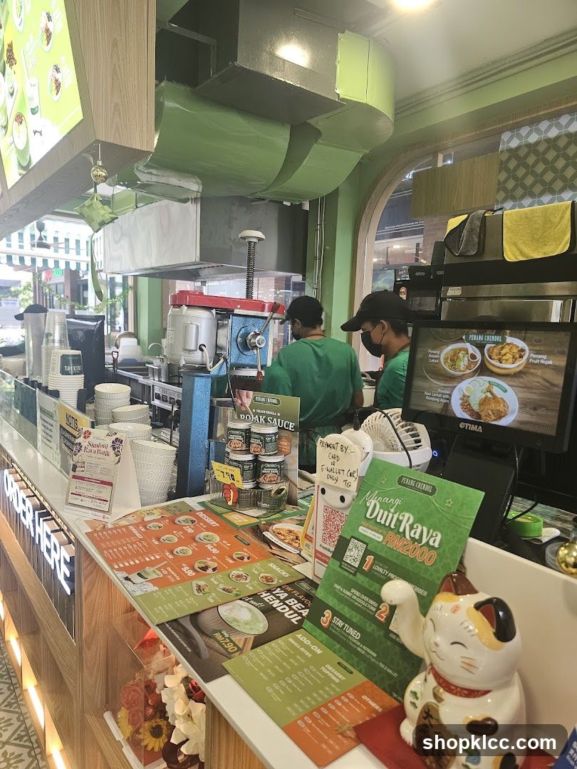 Counter with food displays and staff