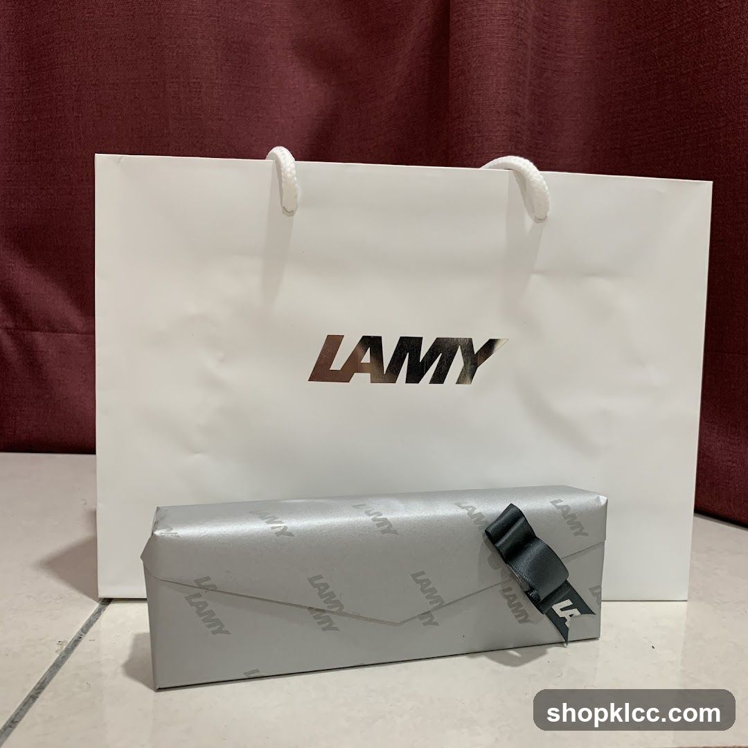 LAMY branded shopping bag and gift-wrapped item