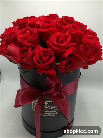 Red Roses in a Black Hat Box