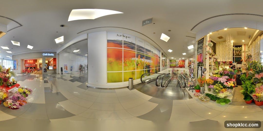 Indoor shopping mall with flower shop and cafe