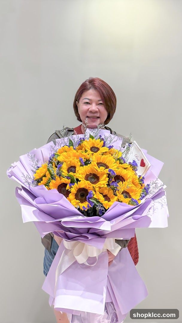 Woman Holding a Sunflower Bouquet