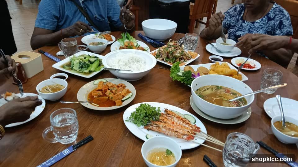 Meal with Grilled Prawns and Various Dishes