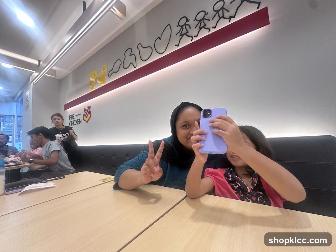 People taking a selfie in a restaurant