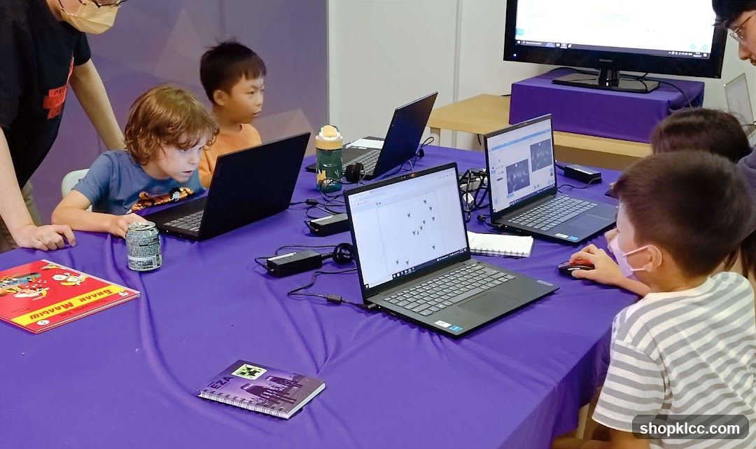 Children learning on laptops