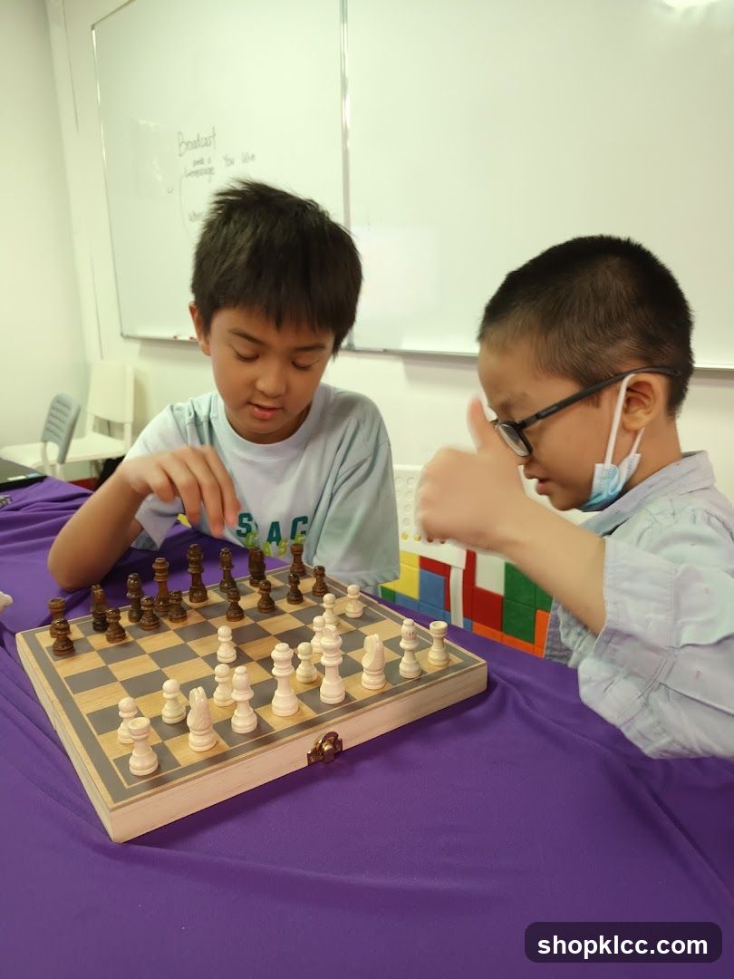 Two boys playing chess