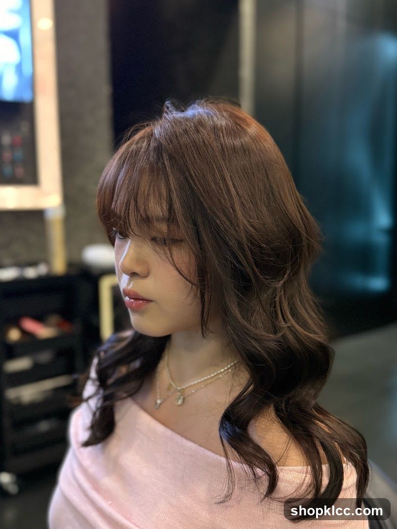 Woman with styled brown hair