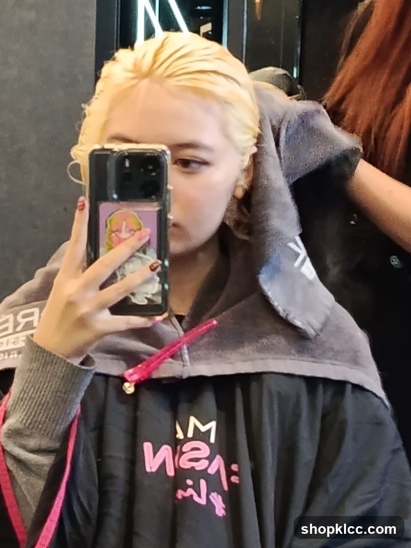 Woman with bleached hair taking a selfie