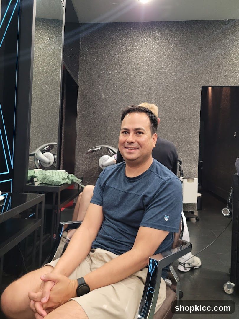 Man sitting in a salon chair