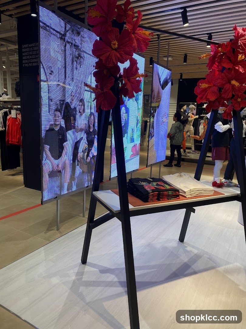 Store Display with Digital Screens and T-shirts