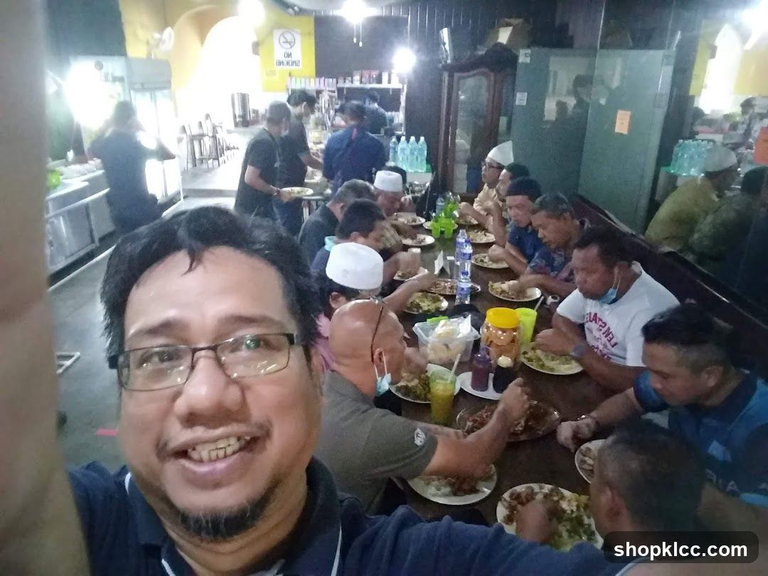 People eating at a long table