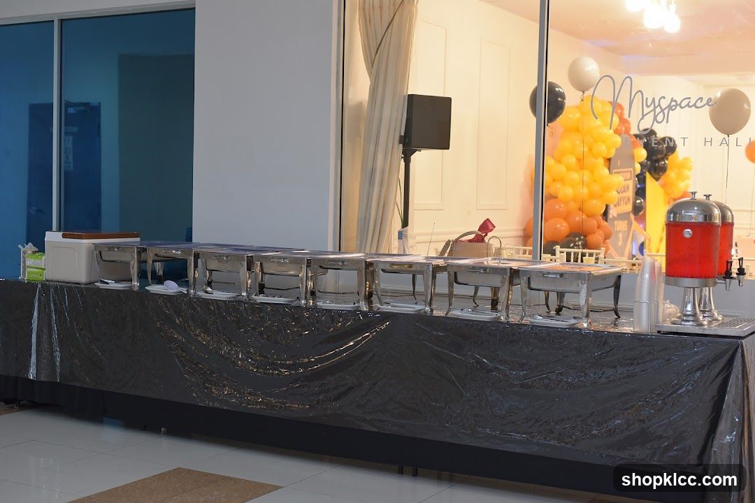 Buffet Setup with Chafing Dishes and Drink Dispensers