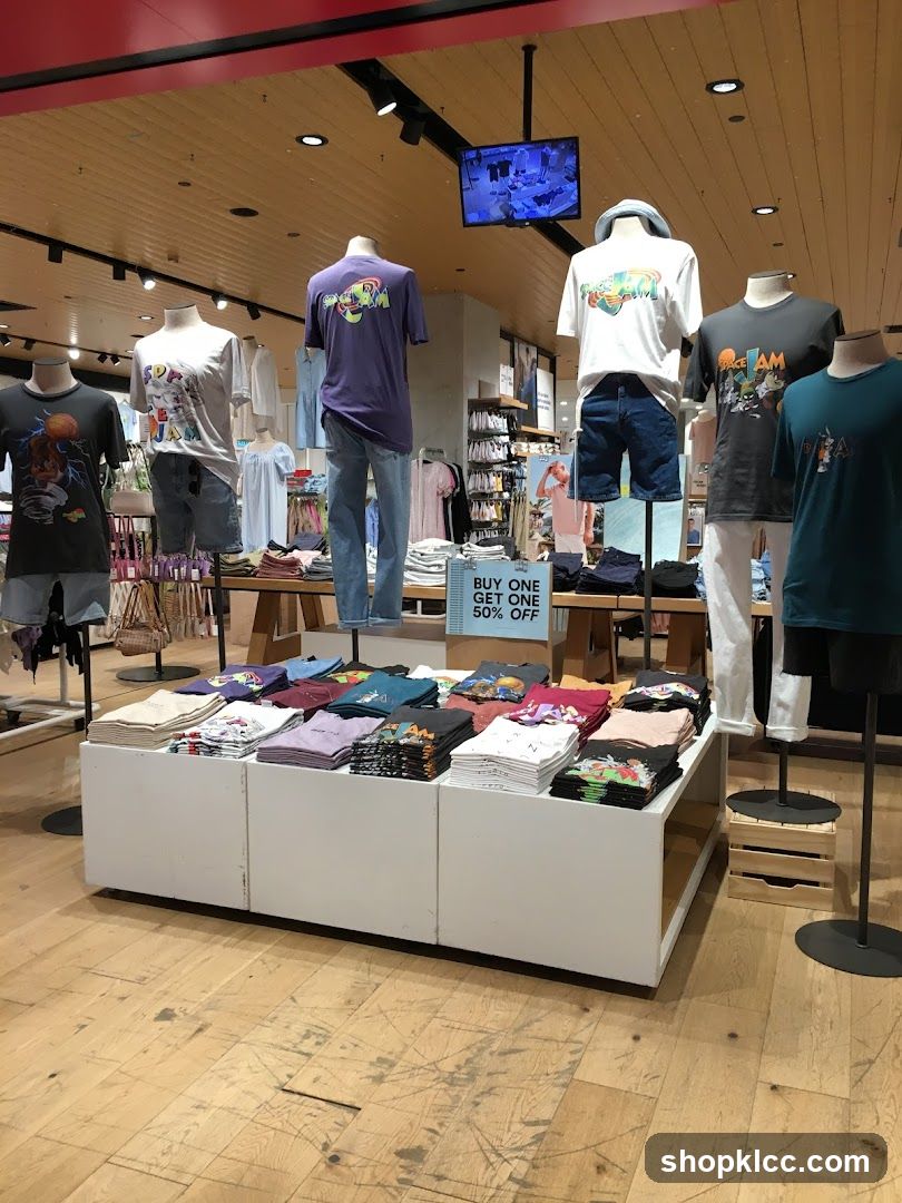 T-shirt display with sale sign