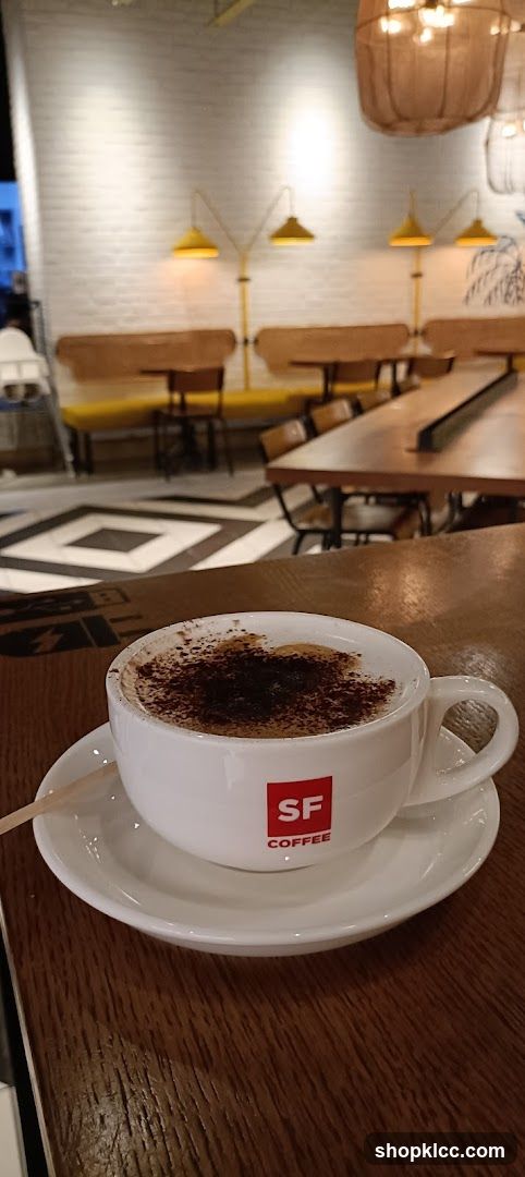 Cappuccino with SF Coffee logo