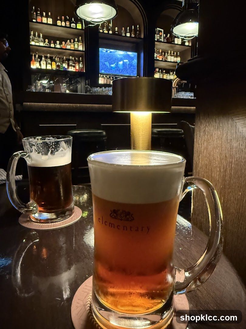 Two Mugs of Beer at a Bar
