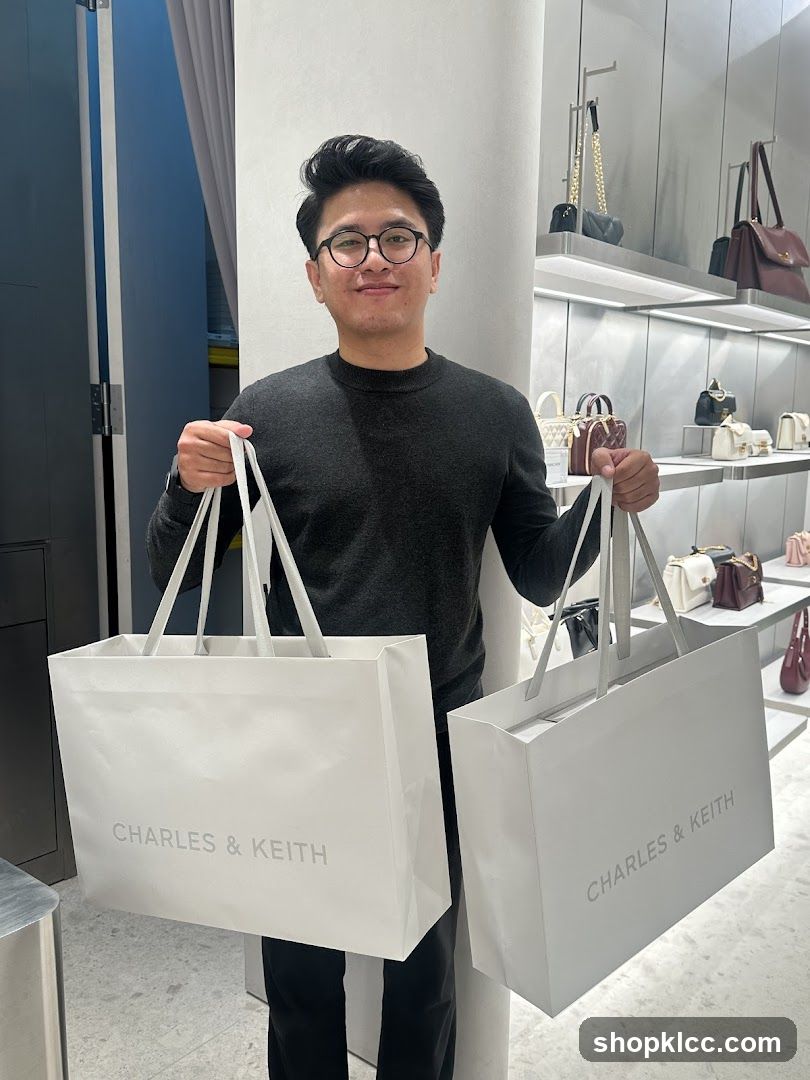 Man Holding Shopping Bags