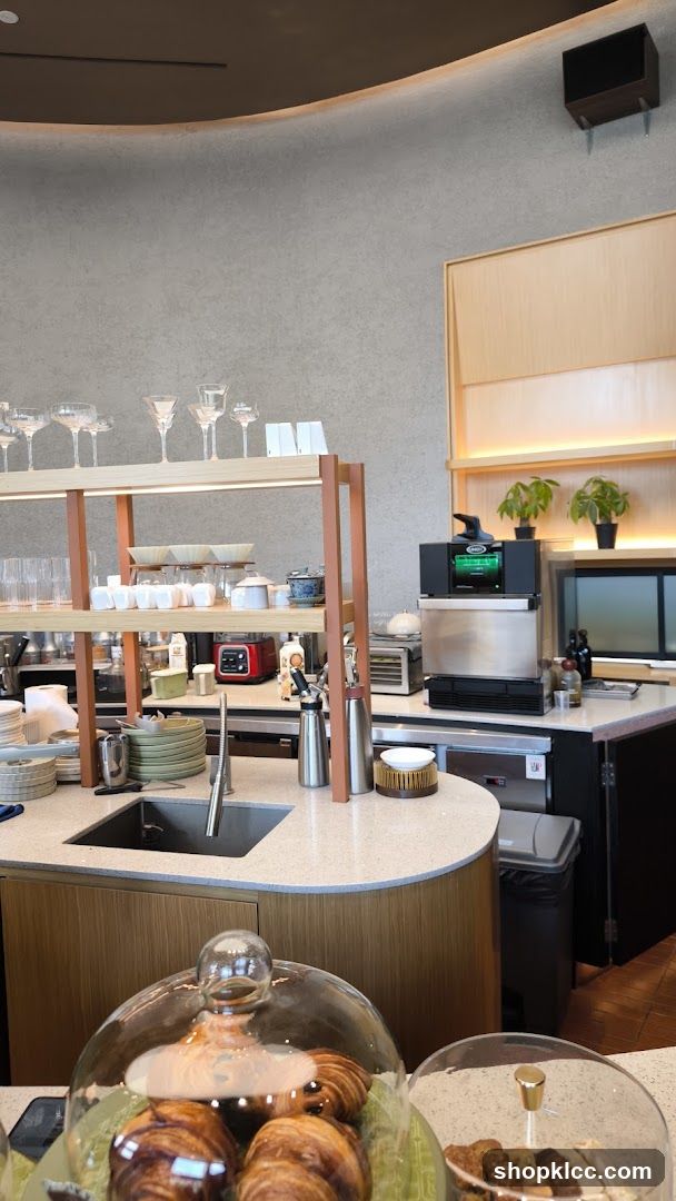 Cafe Counter with Pastries and Equipment