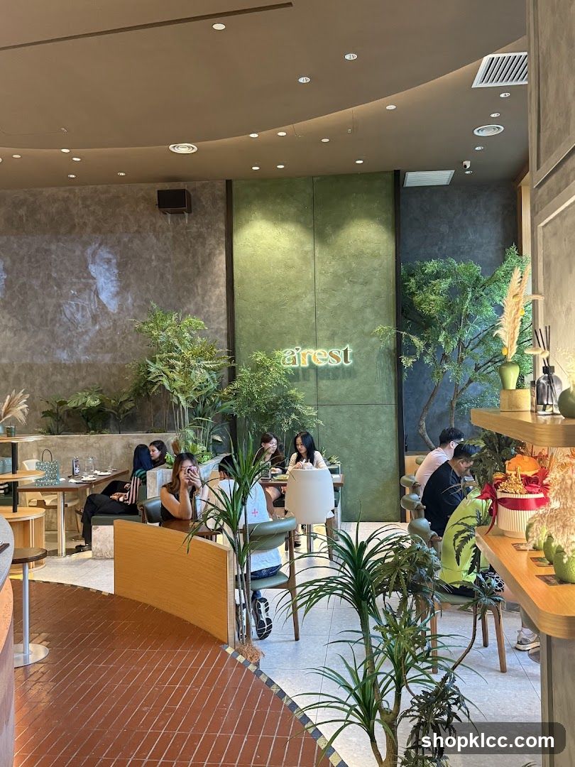 Interior of a cafe with plants and seating