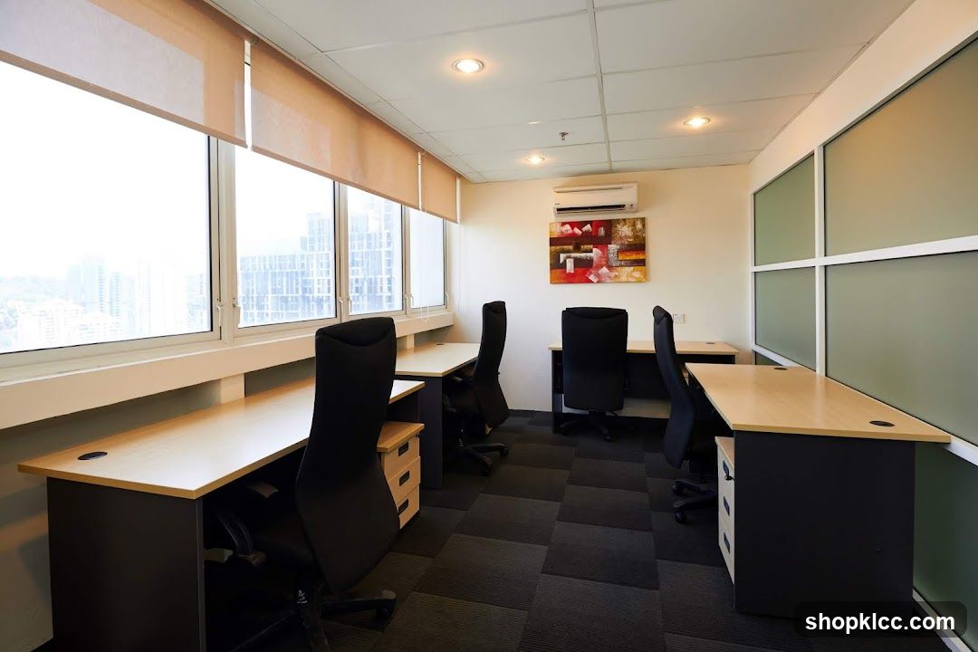 Office Interior with Desks and Windows