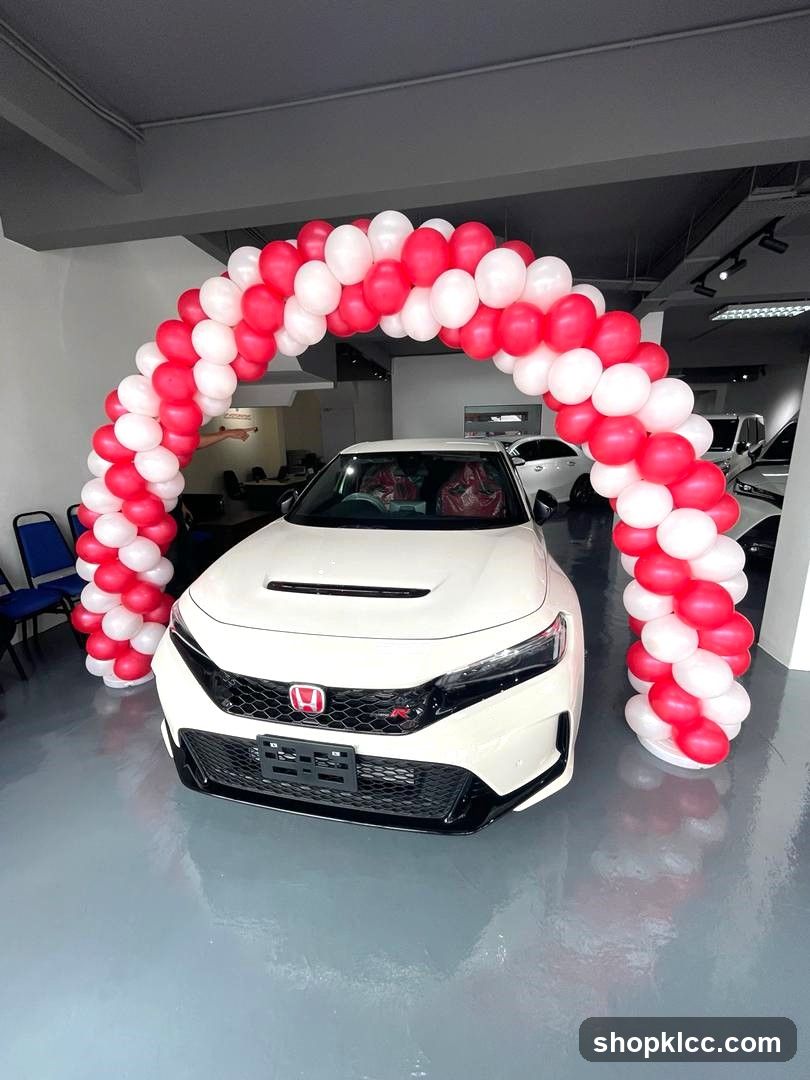 Car Dealership Interior with Balloon Arch