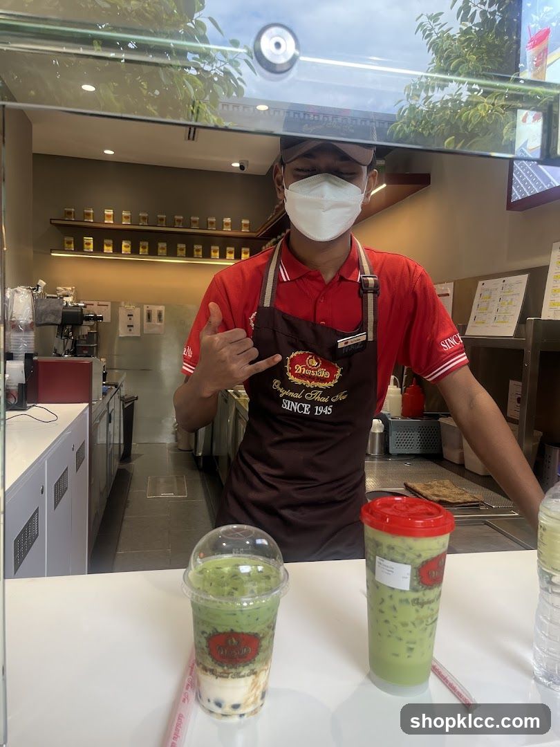 Barista serving drinks