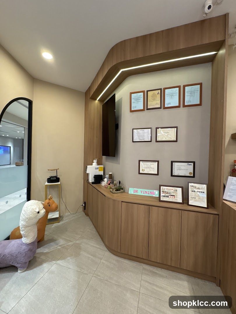 Interior of a modern reception area with certificates and plush toys