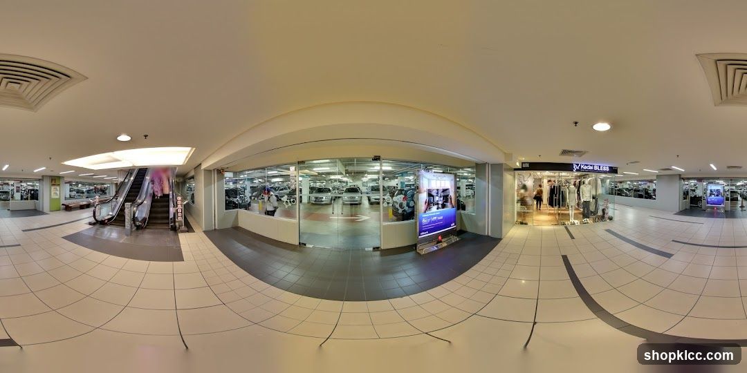 Shopping Mall Interior with Escalators and Shops