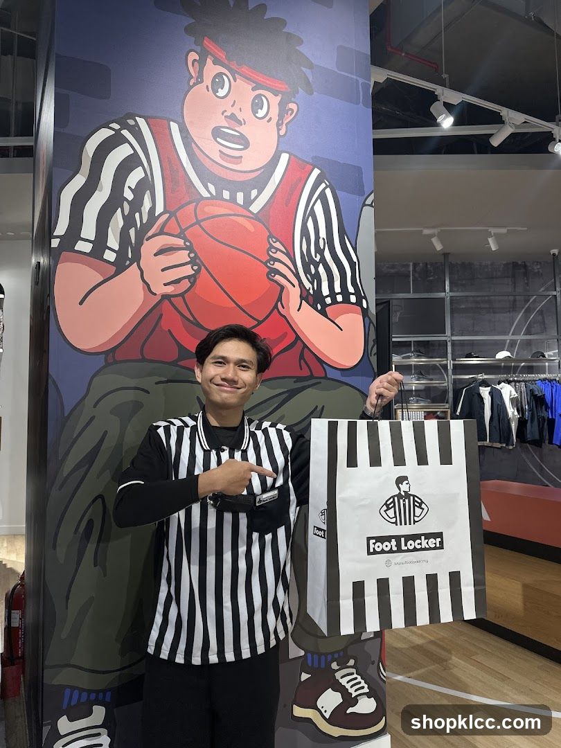 Man with Foot Locker bag