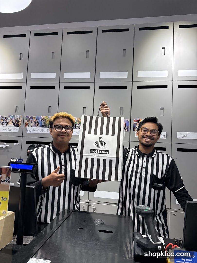 Foot Locker Employees with Shopping Bag